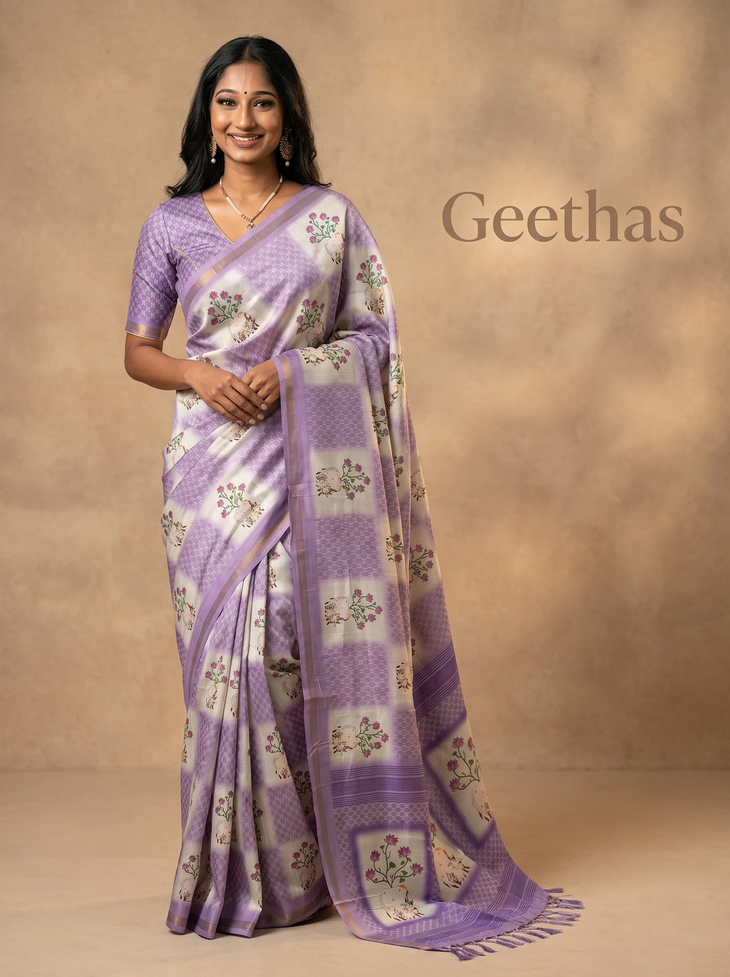 Model wearing a white and violet slub linen saree with floral and cow prints, geometric panels and tassled pallu