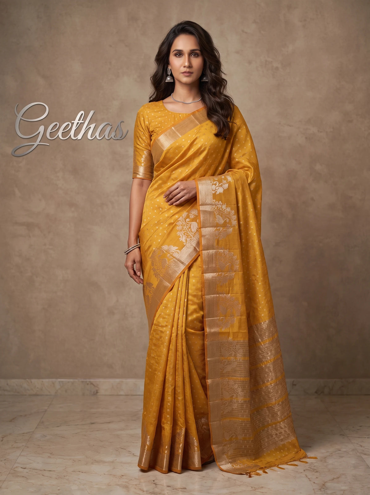 Model wearing golden yellow semi tussar silk saree with floral zari border and woven zari motifs