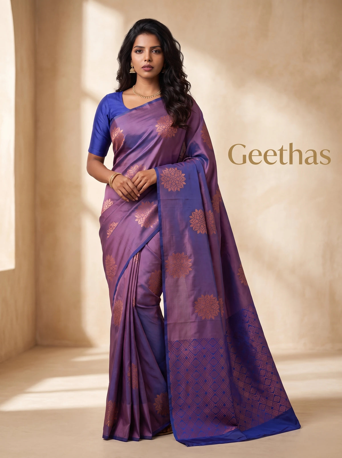 Model wearing lavender soft silk saree with woven motifs, royal blue border and geometric pallu